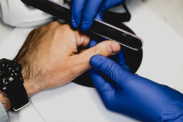 man having manicure