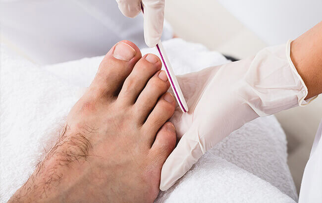 man having pedicure