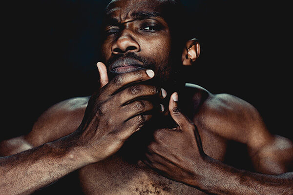 man holding his chin